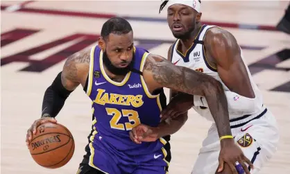  ?? Photograph: Mark J Terrill/AP ?? The Lakers’ LeBron James drives against the Denver Nuggets’ Jerami Grant during the second half of Saturday’s Game 5.