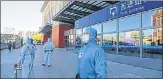  ?? AFP ?? Police officers stand guard outside a railway station in China's Jilin province, on Wednesday.