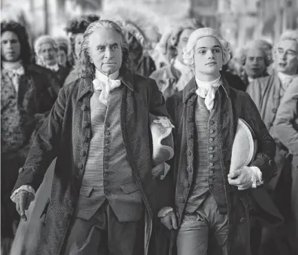  ?? REMY GRANDROQUE­S TNS ?? Michael Douglas, left, as Benjamin Franklin and Noah Jupe as his grandson, Temple, in “Franklin.”