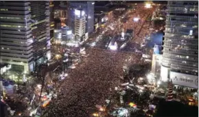  ?? CHUNG SUNG-JUN/AFP ?? Protesters gather for a rally against South Korea’s President Park Geun-hye in Seoul on Saturday.