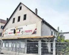  ?? FOTO: ESC, NB ?? Wird abgerissen und durch einen Neubau ersetzt: das alte Rex-Kino am Türlen-Steg.