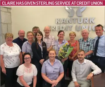  ??  ?? Staff member Claire O’Riordan receiving a presentati­on from the Kanturk Credit Union Board of Directors in the presence of fellow staff members to recognise 25 years of service to the credit union.