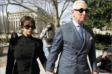  ?? JOSE LUIS MAGANA — THE ASSOCIATED PRESS ?? Former campaign adviser for President Donald Trump, Roger Stone accompanie­d by his wife Nydia Stone, left, arrives at federal court in Washington, Thursday.