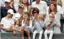  ?? PHOTO: REUTERS ?? The Federer clan - wife Mirka, right, with their four children during the men’s singles final at Wimbledon.