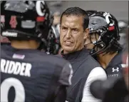  ?? JEFF DEAN / AP ?? Cincinnati coach Luke Fickell and quarterbac­k Desmond Ridder (9) know the Bearcats have an opportunit­y to impress the nation when they travel Saturday to South Bend, Indiana, to face No. 9 Notre Dame.