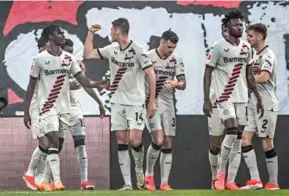  ?? AFP/VNA Photo ?? 50 NOT OUT: Bayer Leverkusen's forward Patrik Schick (centre) celebrates scoring the opening goal with his teammates during the German rst division Bundesliga match against VFL Bochum in Bochum, western Germany on Sunday.