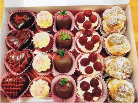  ?? COURTESY OF SERGIO’S BAKERY AND CAFE ?? Sergio’s Bakery and Cafe will offer this dessert box for Valentine’s Day.