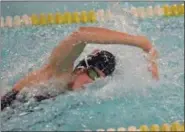  ?? PAUL DICICCO — THE NEWS-HERALD ?? Hawken’s Portia Brown competes in 200 freestyle relay last month during the Chagrin Valley Conference meet at Beachwood. Brown will swim next year at the University of Georgia.