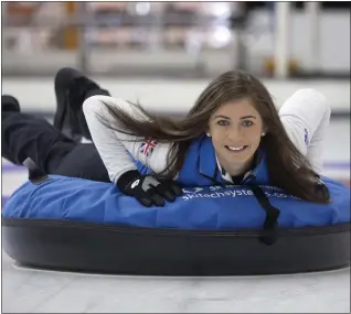  ??  ?? Eve on the ice at Braehead for the latest craze – human curling