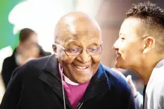  ??  ?? Archbishop Emeritus and Nobel Laureate Desmond Tutu (left), speaks with Razaan Bailey, acting CEO of theTutu Foundation at an exhibition and book launch of notable photograph­s of his life, which have been turned into paintings, in the centre of Cape Town. — AFP photo