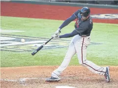  ?? USA TODAY SPORTS ?? Braves first baseman Freddie Freeman hits a two-run home run.