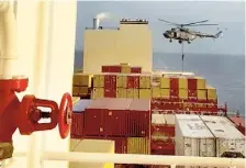  ?? AP ?? Screengrab from a video shows commandos rappelling from a helicopter onto the vessel near the Strait of Hormuz on Saturday.