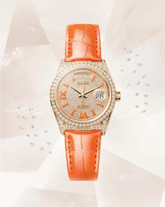  ??  ?? OYSTER PERPETUAL DAY-DATE 36 IN 18 CT YELLOW GOLD AND DIAMONDS WITH A CORAL LEATHER STRAP