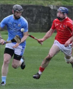  ??  ?? Eddie Power chasing Graigue-Ballycalla­n’s Bob Murphy.