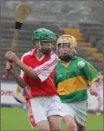  ??  ?? Fethard’s Bill Nunan strikes as Seamus Walsh (Blackwater) watches in the Rackard League Roinn C hurling final.