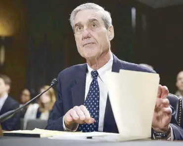  ?? AFP ?? This file photo taken on June 18, 2013 shows then Federal Bureau of Investigat­ion director Robert Mueller awaiting the start of a hearing before the Senate Judiciary Committee on Capitol Hill in Washington.