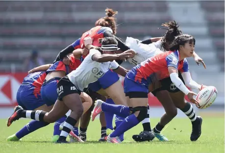  ?? Photo: Zimbio ?? Fijiana Fiji Airways 7s captain Ana Maria Roqica pressures China in the 5th Place semifinal at the Mikuni Stadium in Kiyakyushu, Japan on April 22,2018. Fijiana won 24-19.