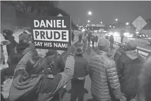  ?? SHAWN DOWD/ USA TODAY NETWORK ?? Marchers make their way toward the Public Safety Building in downtown Rochester, N. Y., late Tuesday after the grand jury’s decision. Protesters expressed their anger, but no arrests or clashes were reported.