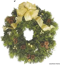  ?? COURTESY PHOTO ?? The “Sunrise” Wreath is among the Garden Club’s holiday greens for sale this year.