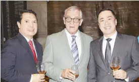  ??  ?? Marco Polo Ortigas Manila director of sales and marketing Roel Constantin­o, Hans Brumann and Marco Polo Ortigas Manila resident manager Mike Yutuc.