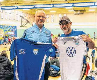  ?? HALIFAX WANDERERS FC ?? Halifax Wanderers sporting director Matt Fegan, left, and Mahone Bay United co-founder and president Tim Merry recently announced a new developmen­t partnershi­p between the two football clubs. Through it, Mahone Bay United will get technical advice from the Wanderers profession­al staff for their youth programs.
