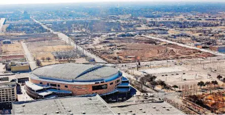  ?? [PHOTO BY JIM BECKEL, THE OKLAHOMAN] ?? Work is well underway on the upper section of Scissortai­l Park, and constructi­on will start later this year east of the park where developmen­t will include a convention center, Omni Hotel, Fairfield Inn and a garage.