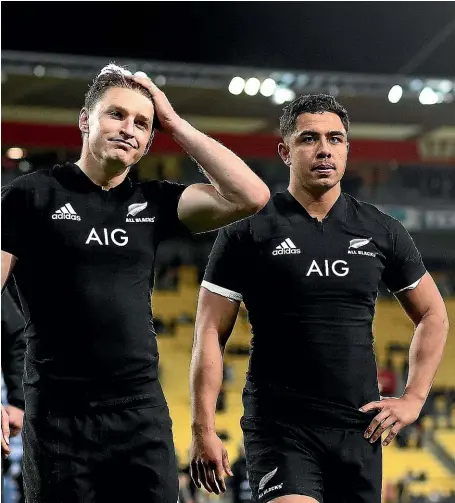  ?? GETTY IMAGES ?? Beauden Barrett, centre, reflects on a frustratin­g night when his goalkickin­g misses proved costly as the All Blacks lost 36-34 to South Africa in Wellington.