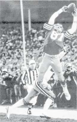  ?? Associated Press file photos ?? San Francisco’s Dwight Clark leaps over Dallas’ Everson Walls to make “The Catch,” which launched the 49ers’ dynasty of the 1980s and sent the Cowboys into a less-than-stellar decade.