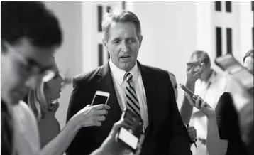  ?? ASSOCIATED PRESS ?? IN THIS JULY 13, 2017, FILE PHOTO, Sen. Jeff Flake, R-Ariz. speaks to members of the media as he walks to a meeting on Capitol Hill in Washington.
