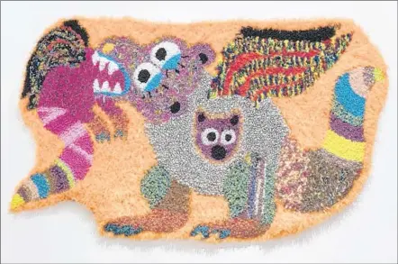  ??  ?? HANNAH EPSTEIN’S “Monster World” exhibition at Steve Turner on Santa Monica Boulevard features her latch hook rug designs.