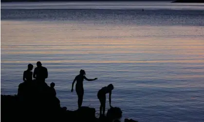  ?? Photograph: Julie Jacobson/AP ?? Twilight at the edge of Kingman Wash at Lake Mead national recreation area in Arizona, where health officials say the teen may have been exposed.