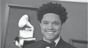  ?? FILE/JORDAN STRAUSS/INVISION/AP ?? Trevor Noah will host the Grammy Awards for a third-straight year.