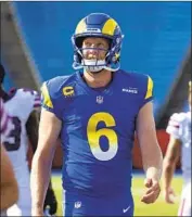  ?? Brett Carlsen Associated Press ?? JOHNNY HEKKER is taking his limited role in stride, having punted only f ive times in three games.