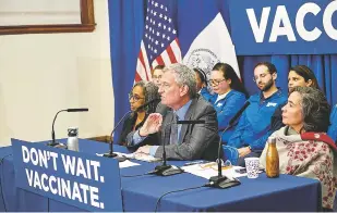  ?? JOHN TAGGART/NEW YORK TIMES ?? Mayor Bill de Blasio speaks Tuesday in Brooklyn, where a measles outbreak occurred this year. DeBlasio declared a public health emergency that would require unvaccinat­ed individual­s living in Williamsbu­rg, Brooklyn, to receive the measles vaccine.