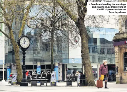  ??  ?? > People are heeding the warnings and staying in, as this picture of Cardiff city centre taken on Saturday shows