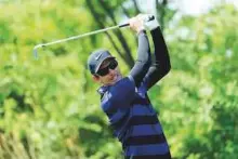  ?? AFP ?? Dylan Frittelli plays a shot during the China Open in Beijing on Friday. Frittelli hit eight birdies to finish 19-under.