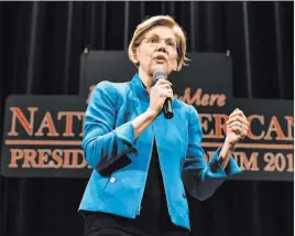  ?? Tim Hynds The Associated Press ?? Sen. Elizabeth Warren, D-mass., speaks Monday during the Frank Lamere Native American Presidenti­al Forum at the Orpheum Theatre in Sioux City, Iowa.