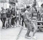  ?? MACALL POLAY/WARNER BROS. ENTERTAINM­ENT ?? Anthony Ramos, left, and Melissa Barrera in a scene from “In the Heights.”