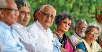  ??  ?? Writer Arundhati Roy attends a protest organised by the activists of Campaign against State Repression on Rights over various issues at Jantar Mantar in New Delhi on Friday.