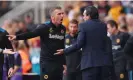  ?? Jack Thomas/WWFC/Wolves/Getty Images ?? Unai Emery (right) argues with Gary O’Neil, the Wolves manager. Photograph: