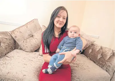  ?? Picture: Michael Schofield. ?? “It’s more my son I think about...”: Tyla and Preston at home in Lochgelly.