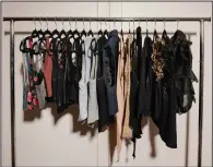  ?? (The New York Times/Maggie Shannon) ?? A rolling rack is a good way to view accumulate­d clothing, a display that Chellie Carlson says “is so powerful, you can’t unsee it.”