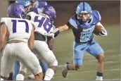  ?? Dan Watson/The Signal ?? Saugus running back Jacob Faraldo (26) runs for a first down against Rancho Cucamonga in the second quarter at College of the Canyons on Friday.