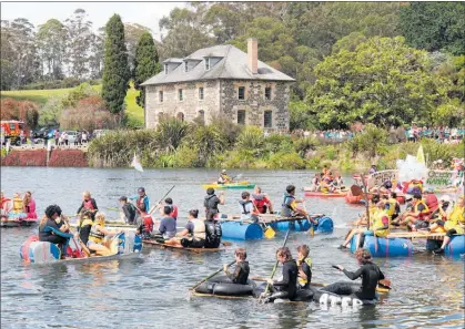  ??  ?? The 45th Kerikeri High School raft race gets underway with the historic backdrop of the Stone Store.