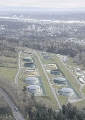  ?? JONATHAN HAYWARD/THE CANADIAN PRESS ?? The Kinder Morgan Trans Mountain project’s oil storage tank farm in Burnaby, B.C. The City of Burnaby says that the proposed Trans Mountain pipeline expansion would cut through a designated conservati­on site.