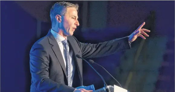  ?? RYAN TAPLIN/SALTWIRE NETWORK ?? Tim Houston acknowledg­es the crowd at the Halifax Exhibition Centre after he was named the new leader of the Nova Scotia Progressiv­e Conservati­ve Party on Oct. 27.