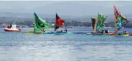  ?? KEITH BACONGCO ?? MAY THE BEST SAILOR WIN Ipinarada ng mga partisipan­te ang kanilang makukulay na bangka sa Davao Gulf, sa taunang Bigiw Regatta-Sail at Speed Competitio­n sa Samal Island, Davao del Norte kahapon.