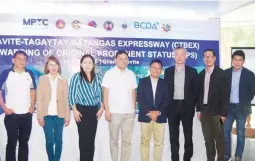  ??  ?? Joining DPWH Sec. Mark Villar (fourth from left) and Silang Mayor Emilia Lourdes Poblete (third from left) during the CTBEx awarding ceremonies are, from left: Lalaan, Silang Bgy. Capt. Romeo Toledo; DPWH Usec. Catalina Cabral; MPT South President &amp; CEO Jose Luigi Bautista; Cathay Land President Jeffrey Ng; Cathay Land Corporate Sec. Ronald Uy and MPT South CFO Christophe­r Liso.