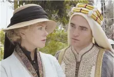  ??  ?? SUMMIT: Aristocrat Gertrude Bell (Nicole Kidman) encounters T.E. Lawrence (Robert Pattinson) in the Middle East in ‘Queen of the Desert.’