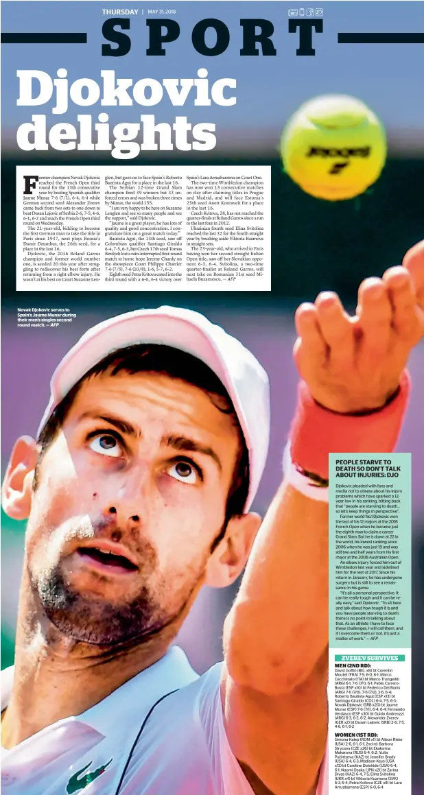  ?? AFP ?? Novak Djokovic serves to Spain’s Jaume Munar during their men’s singles second round match. —